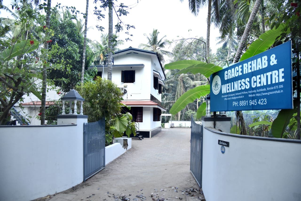 The Grace Rehab facility exterior, surrounded by greenery