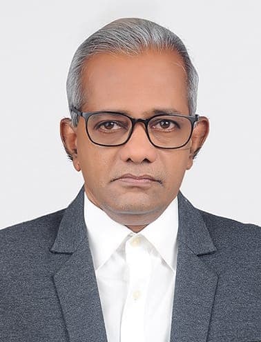 Portrait of Radhakrishnan T P, Leadership Team